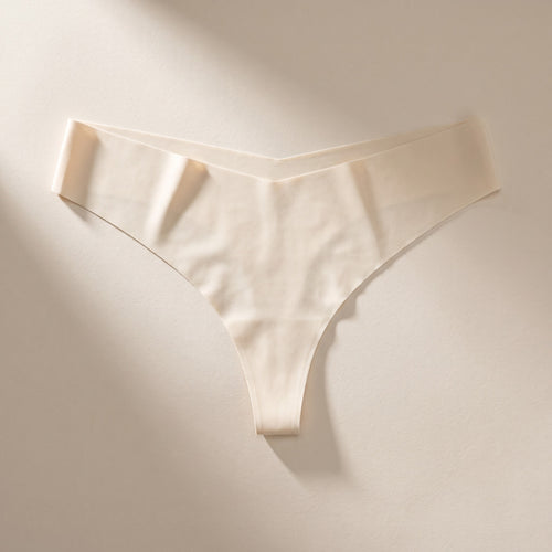 Mauchi Seamless Tanga in Vanille flach ausgelegt